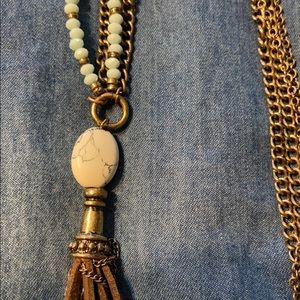 Necklace with suede tassel